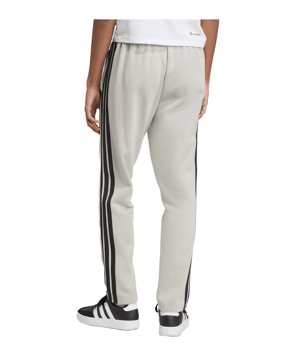adidas Essentials Three Stripes Fleece Open Hem Hose Grau - grau