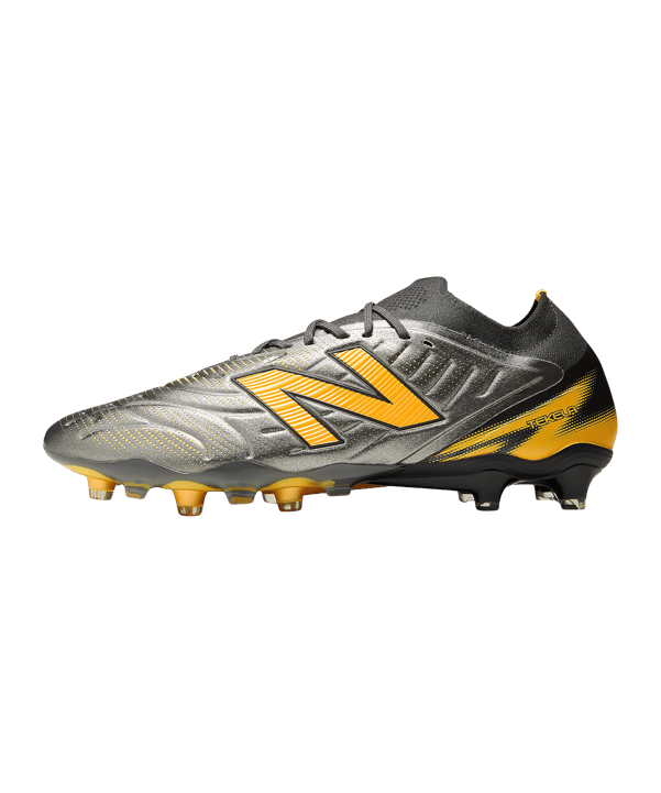 New Balance Tekela Elite Low Laced V5 FG Catalyst Grau