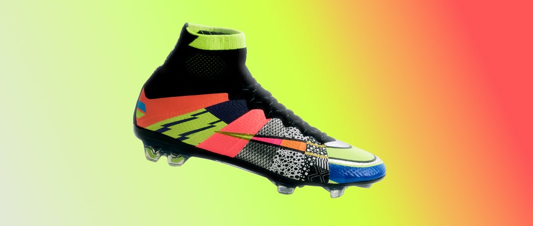 Nike Mercurial Superfly black colorway with neon yellow collar and multicolor graphic pattern on gradient background