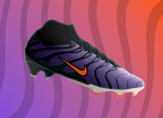 Nike Mercurial Vapor low-cut soccer cleat featuring purple upper with geometric chevron texture, neon orange swoosh and soft ground stud configuration
