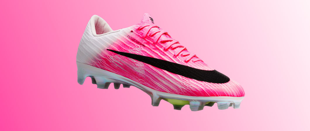 Nike Mercurial Superfly football boot in pink gradient colorway with black swoosh and FG studs