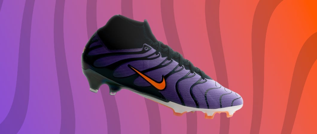Nike Mercurial Vapor football boot in purple with black accents, orange swoosh, chevron design pattern and SG studs on multicolor striped background