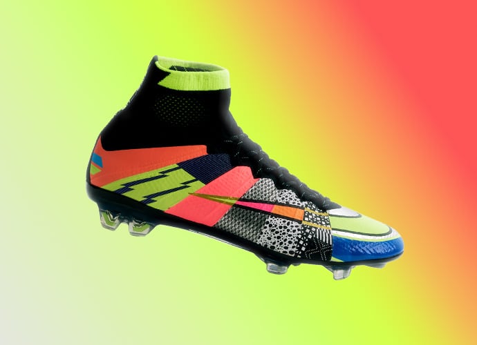 Nike Mercurial Superfly football boot featuring black upper with neon yellow Dynamic Fit collar, orange pink blue accents and FG studs