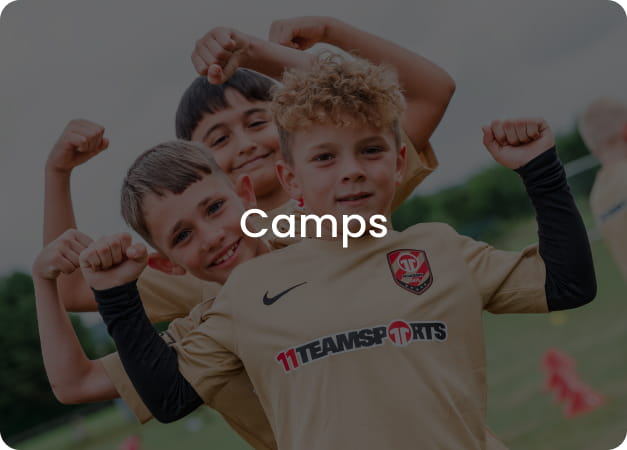 Three happy boys flexing muscles in golden 11teamsports football kits - Book children's football camps now at 11teamsports Academy