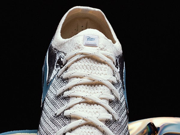 Nike x Patta Vapor 16 AQUA &ndash; Closeup on Flyknit mesh collar with lacing with Patta label
