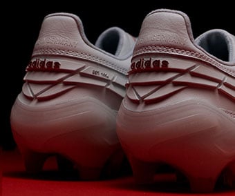 detail view on the 3D shaped heel with red adidas font