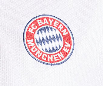 Embroidered old FC Bayern e.V. emblem on jacquard knit fabric