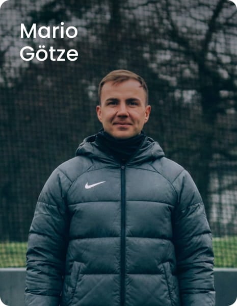 German international Mario Götze posing with in black football kit - 11teamsports Football Academy ambassador