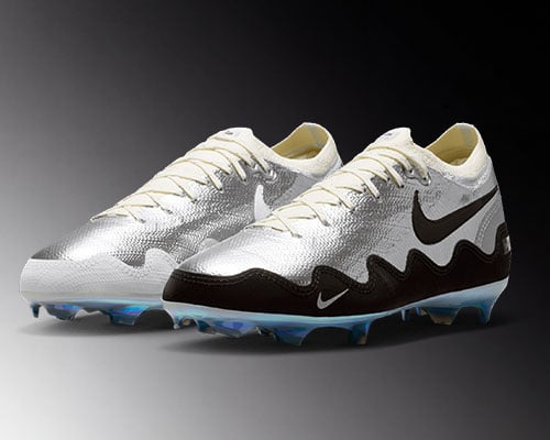 Nike x Patta Mercurial Vapor 16 Pro FG Kids UNITE Edition &ndash; diagonal view on a pair of black and white Patta Unite cleats