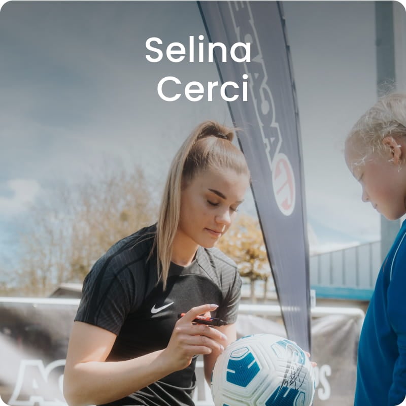 German international Selina Cerci posing with ball in black football kit - 11teamsports Football Academy ambassador