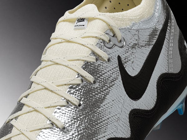 Nike x Patta Vapor 16 Pro Kids UNITE &ndash; detail view on lacing and collar with Patta Lable