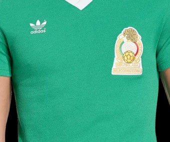 Thermally printed adidas Trefoil logo and sewn-on FMF federation emblem retro crest on chest