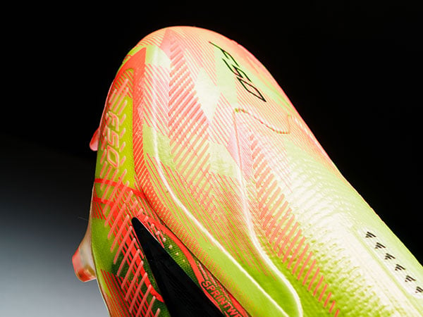 Closeup on the toebox of the adidas F50 Hyperfast ELITE LL FG in first launch edition with grip elements