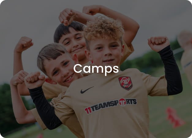 Three happy boys flexing muscles in golden 11teamsports football kits - Book children's football camps now at 11teamsports Academy