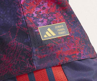 Close-up of the graphic print and authenticity label