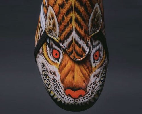 Closeup on toebox of adidas x Y-3 Predator with legendary 2006 beast pack tiger design