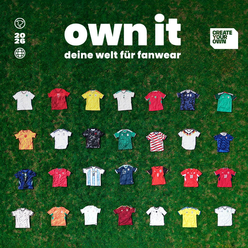 Aerial view of colourful international football kits on grass - Shop official fanwear at 11teamsports