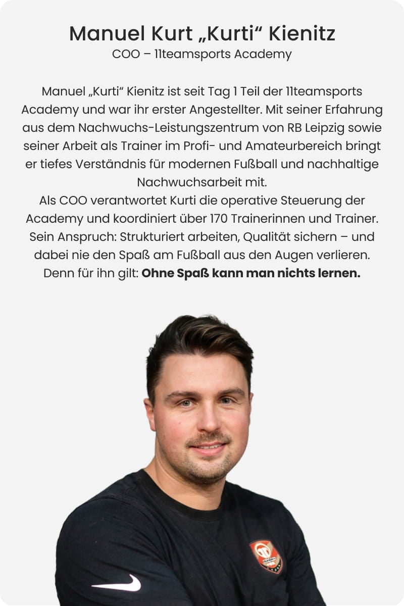 Manuel Kurti Kienitz, COO of 11teamsports Academy and former RB Leipzig youth coach, smiling with arms crossed in black Nike shirt