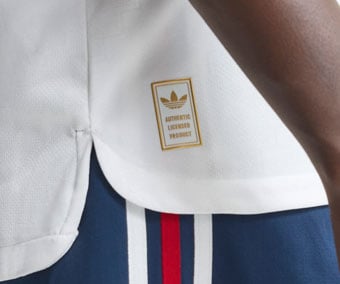 Extended back cut with golden heat-applied badge of authenticity