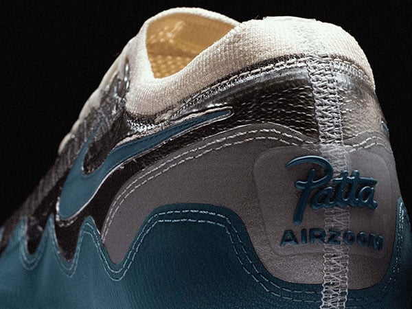Nike x Patta Vapor 16 AQUA &ndash; detailview on heel with 3D Patta Logo and AIRZOOM font