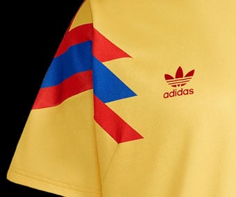 Red and blue oversized adidas 3-stripes on arm and embroidered Trefoil logo on chest of the Colombia 1990 away jersey